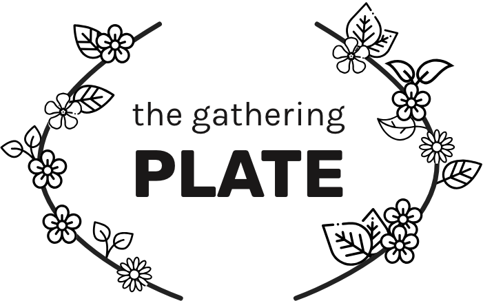 Initial logo design in black and white showing floral elements around the words 'the gathering plate'